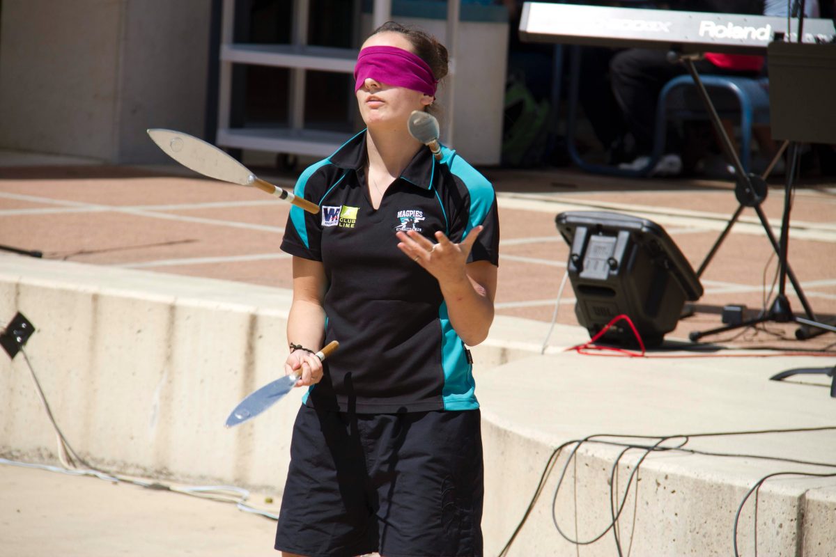 Heather Anderson juggling while blindfolded in Year 12 at Lake G. Photo: Supplied.