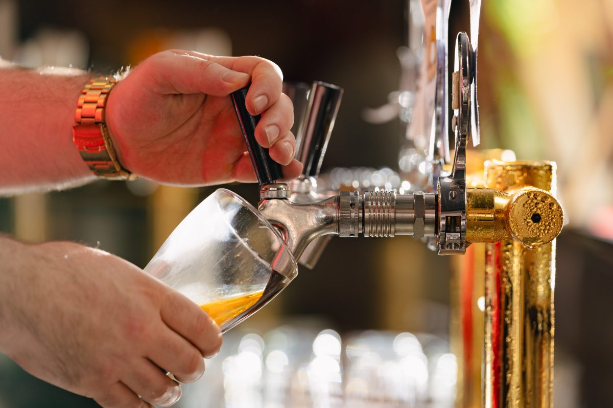 Beer being poured from tap