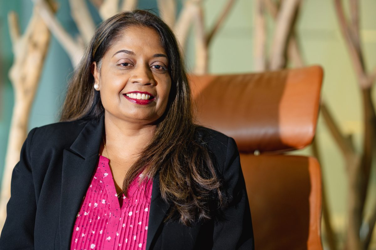 executive woman sitting in office chair