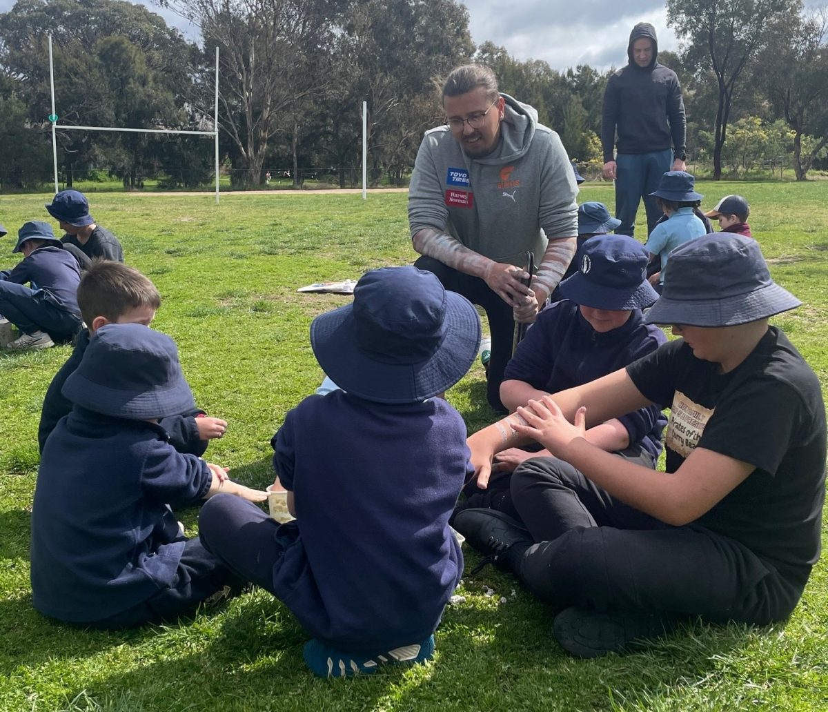 Indigenous educator Josh Sly speaking to school kids