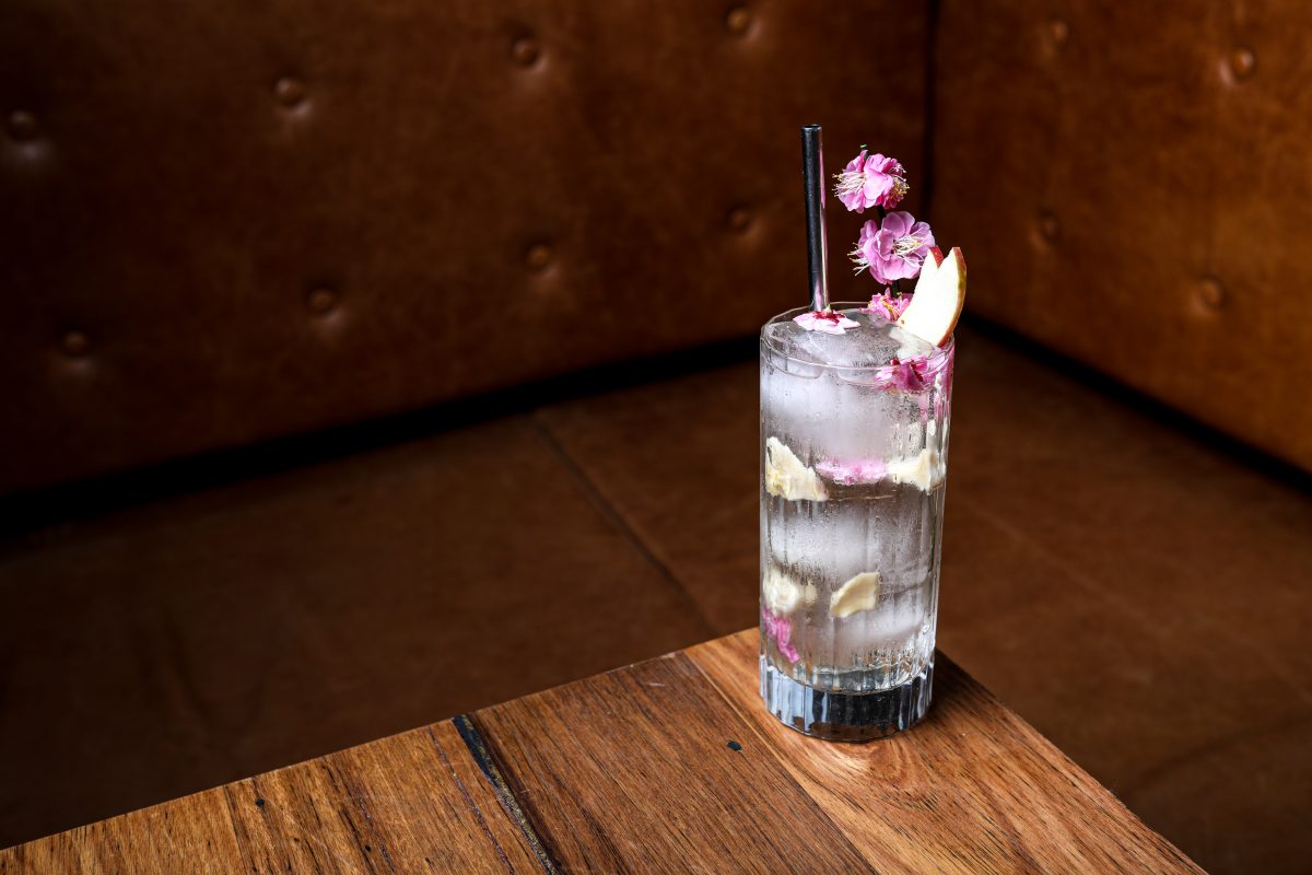 Drink in glass with flowers