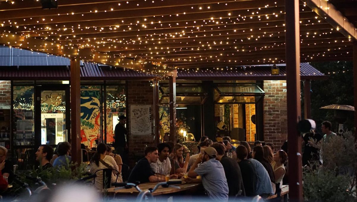 outdoor dining with fairy lights