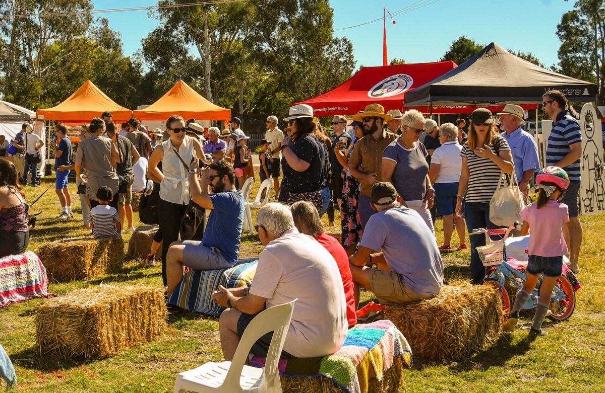 crowd of people at outdoor market