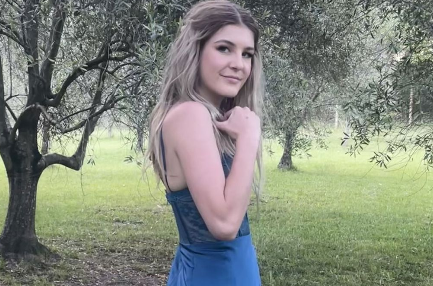 Young woman in blue dress