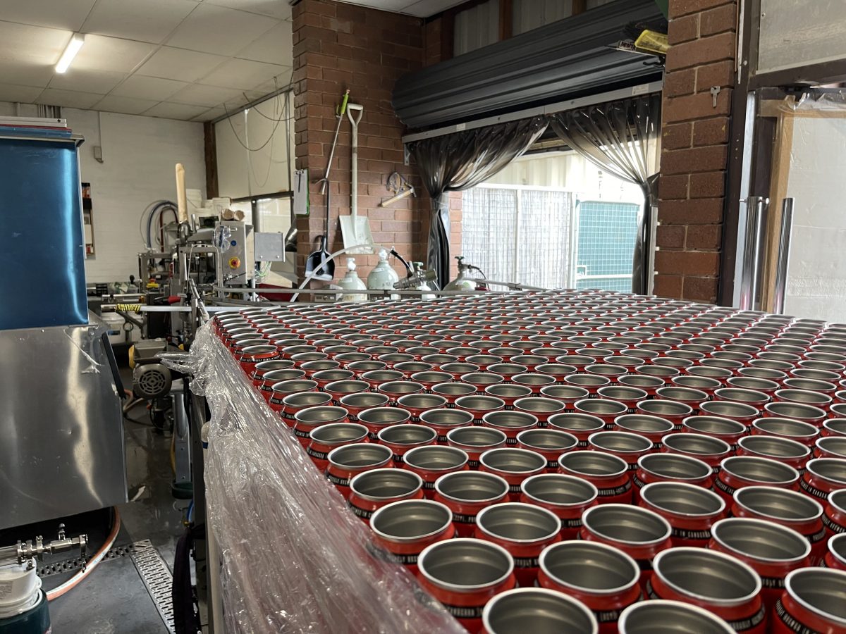 pallet of cans ready to be filled