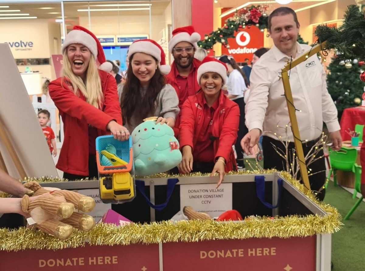 people collecting present for Christmas appeal