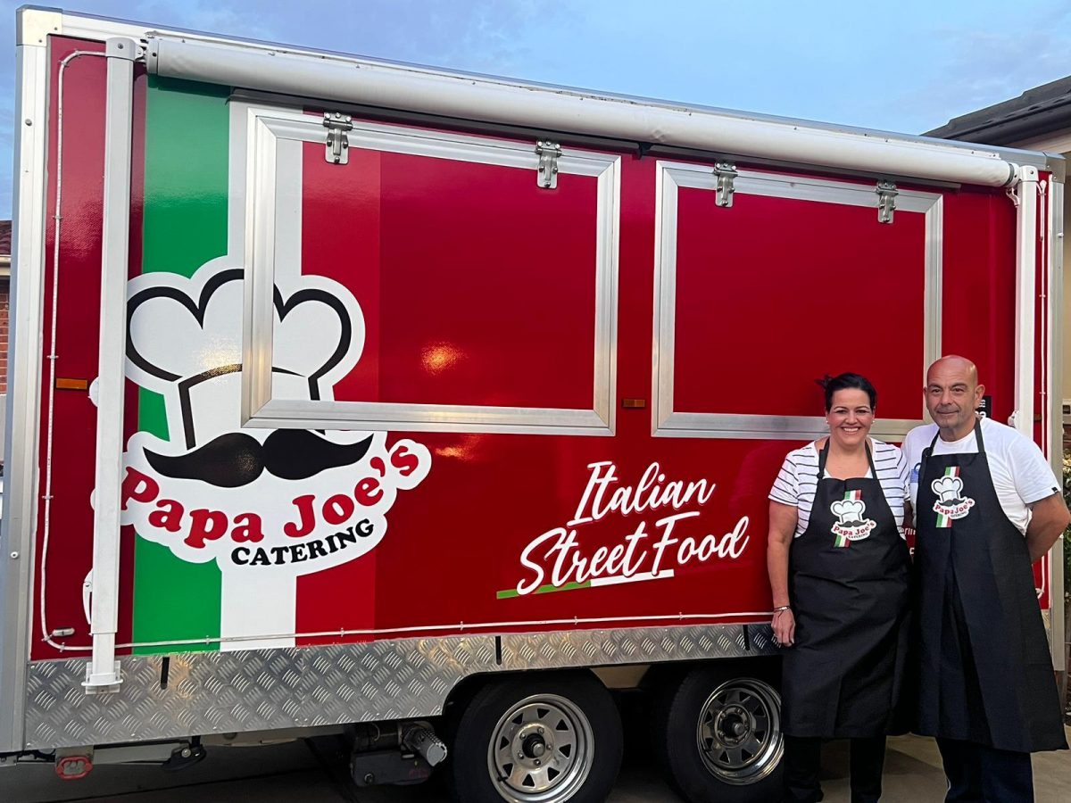 Man and woman outside food truck