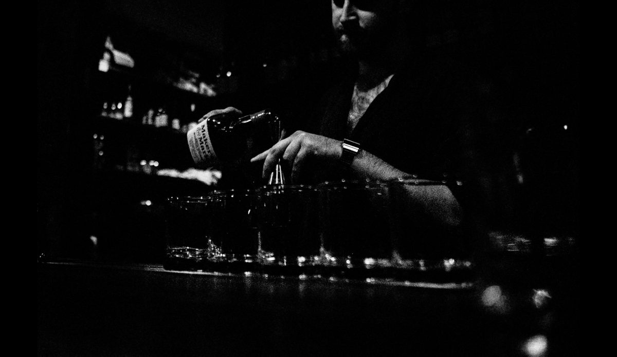 Man pouring whisky