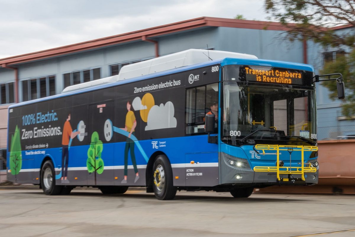 Electric bus being driven on a road