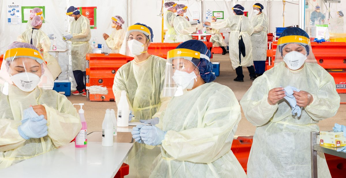 health workers in protective clothing