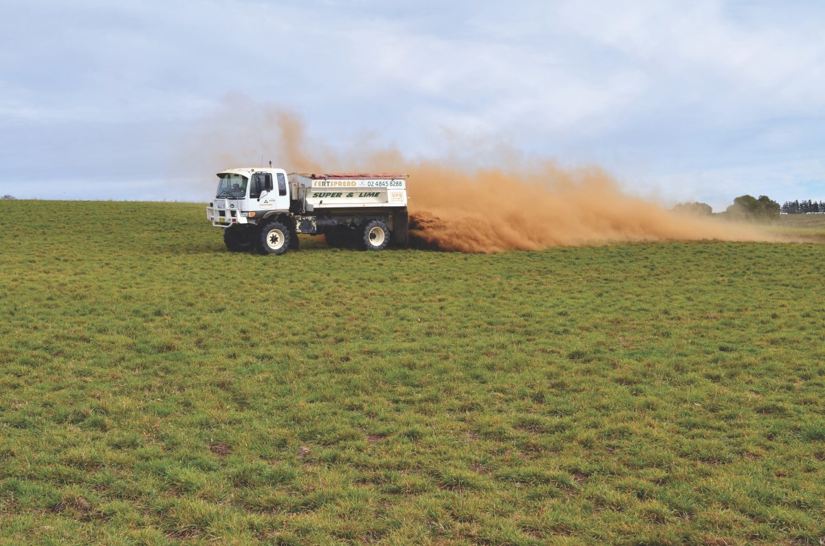 Agri-Ash being spread over a field as fertiliser