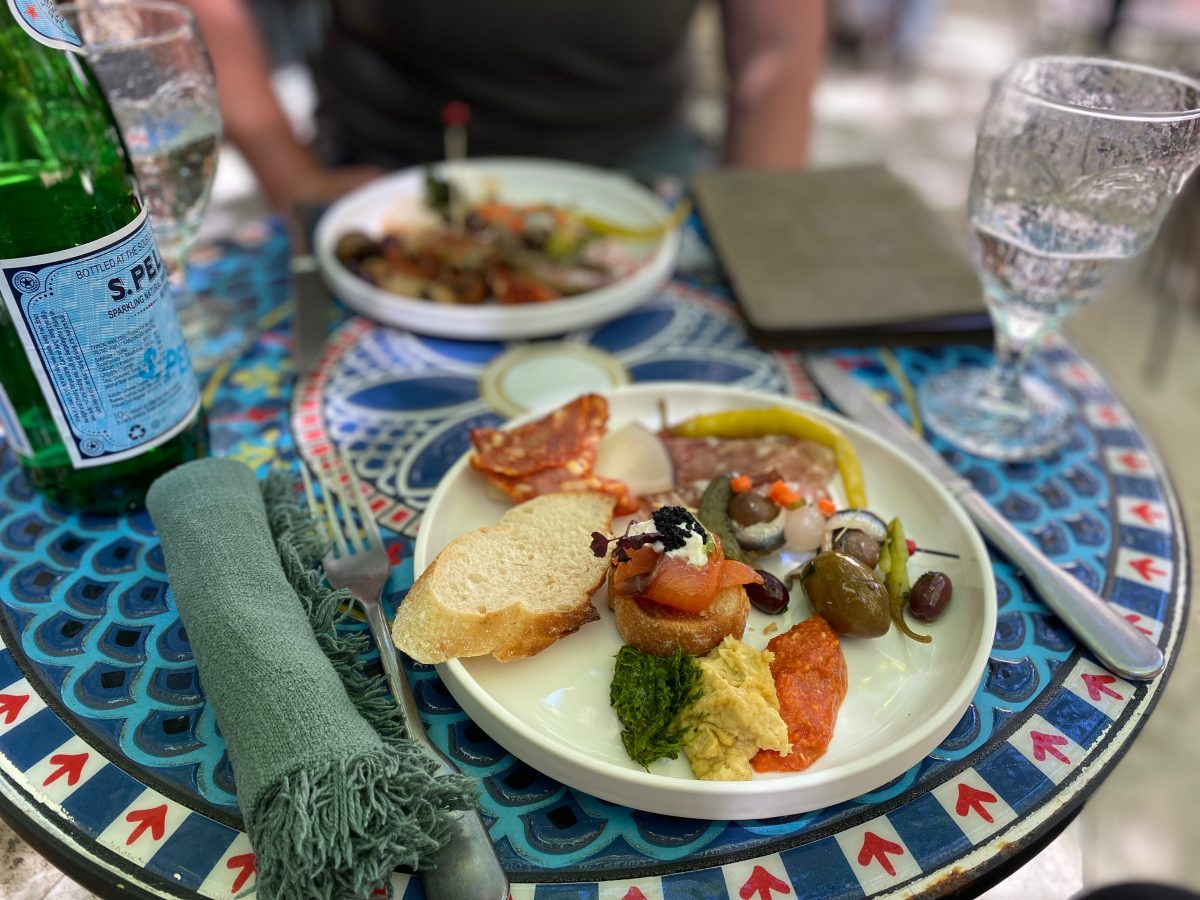 tapas on a plate in the courtyard