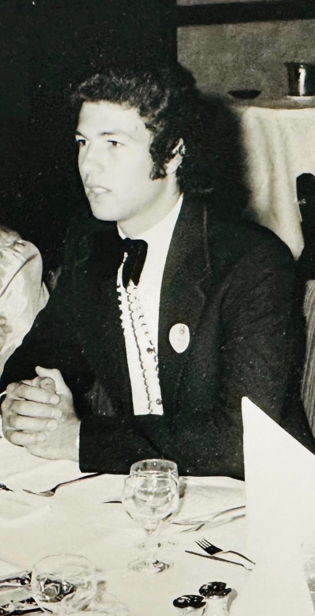 black and white photo of man in a tuxedo from the early 1970s