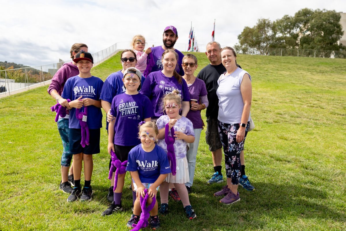 people dressed in purple at the Walk for Epilepsy 2022 event