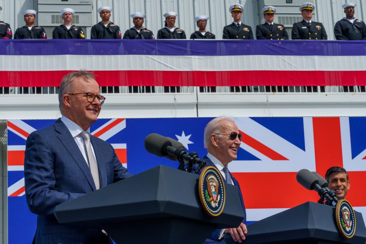 Prime Minister Anthony Albanese, US President Joe Biden, and British PM Rishi Sunak at podiums