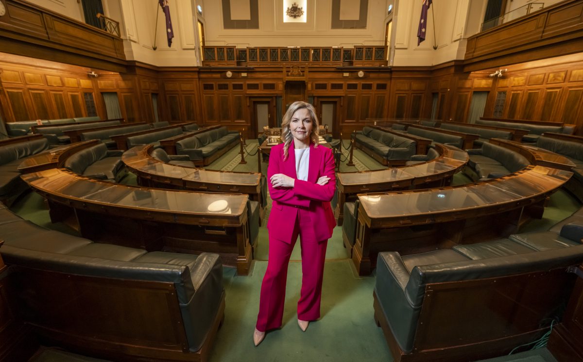 Justine Clarke standing in the House of Representatives in Old Parliament House