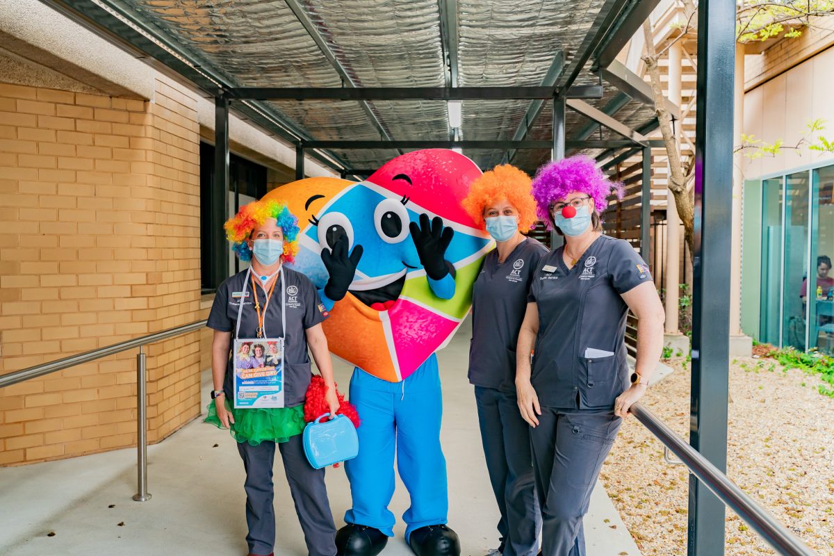 Canberra Hospital staff dressed as clowns with Canberra Hospital Foundation mascot Hearty