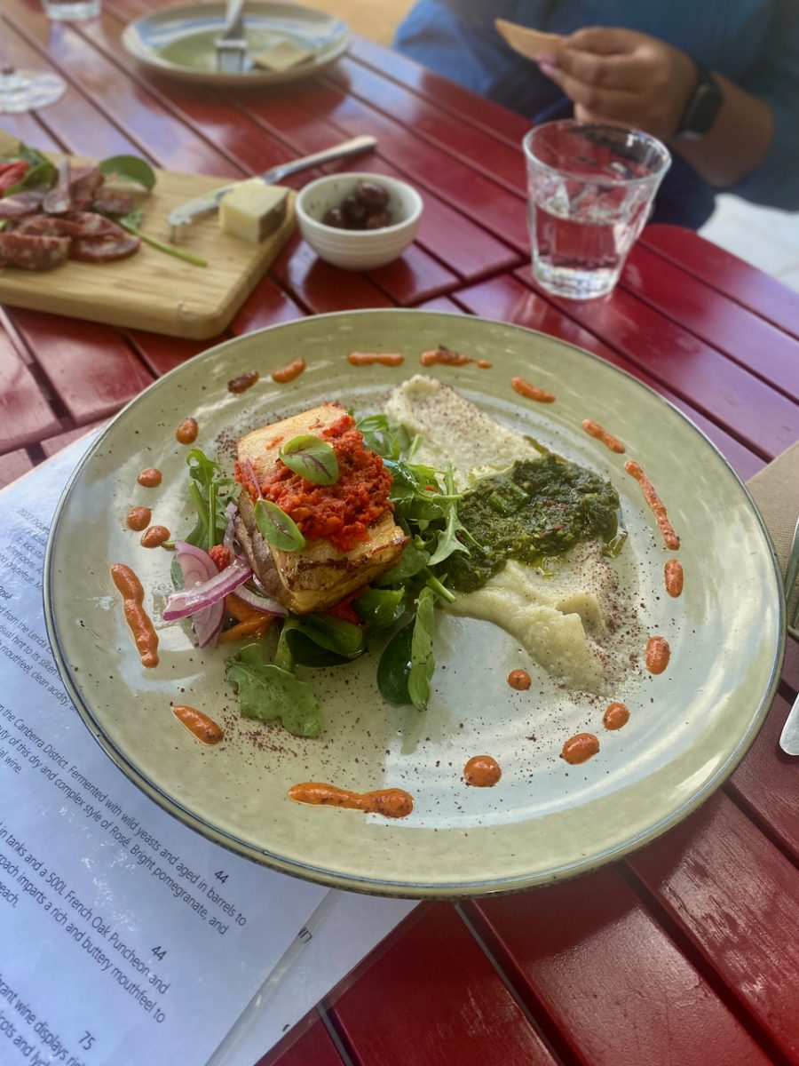 Colourfully plated dish of pork