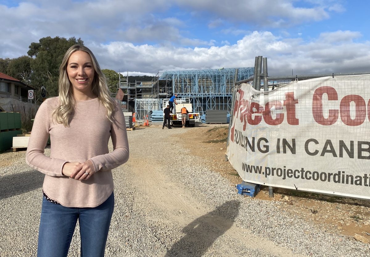 woman standing at construction site