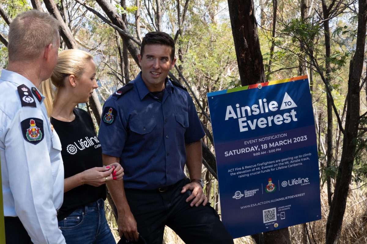 ACT Fire and Rescue acting chief officer Paul Flynn (left) and CEO of Lifeline Canberra Carrie-Ann Leeson (centre) with Firefighter Sean Guinard (right) who first proposed the event.