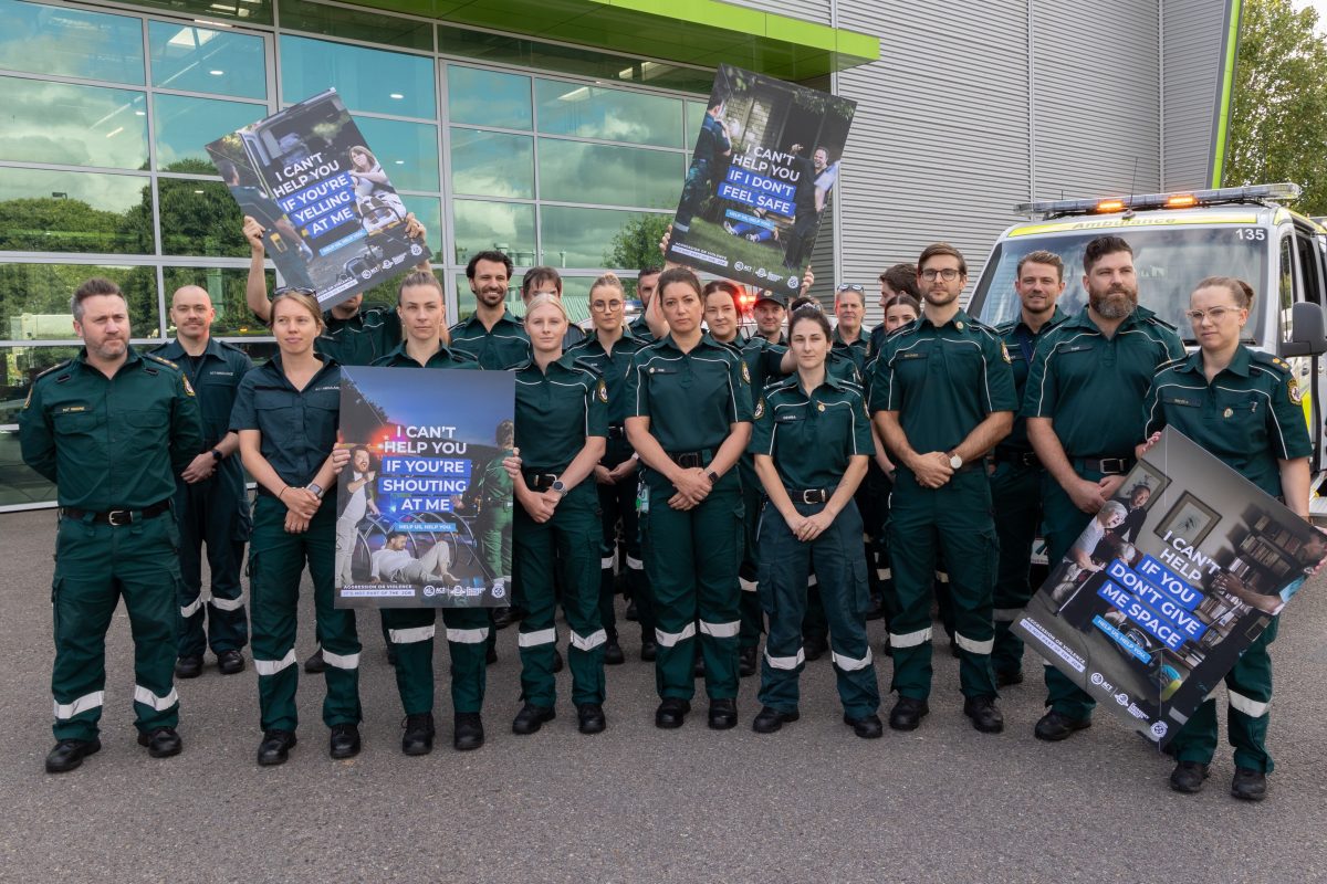 paramedics holding signs of protest