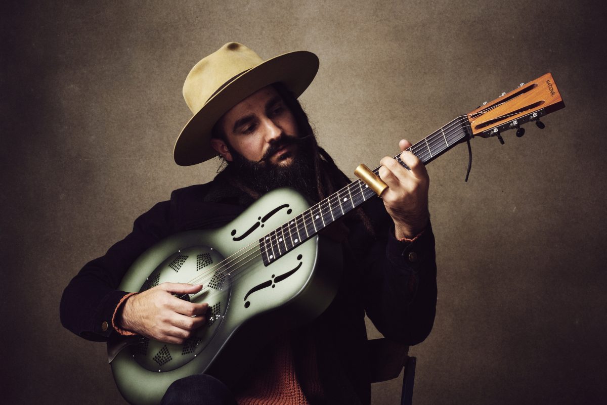 Musician holding guitar