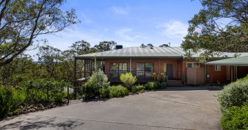 Country living and urban amenities in this stunning Greenleigh home