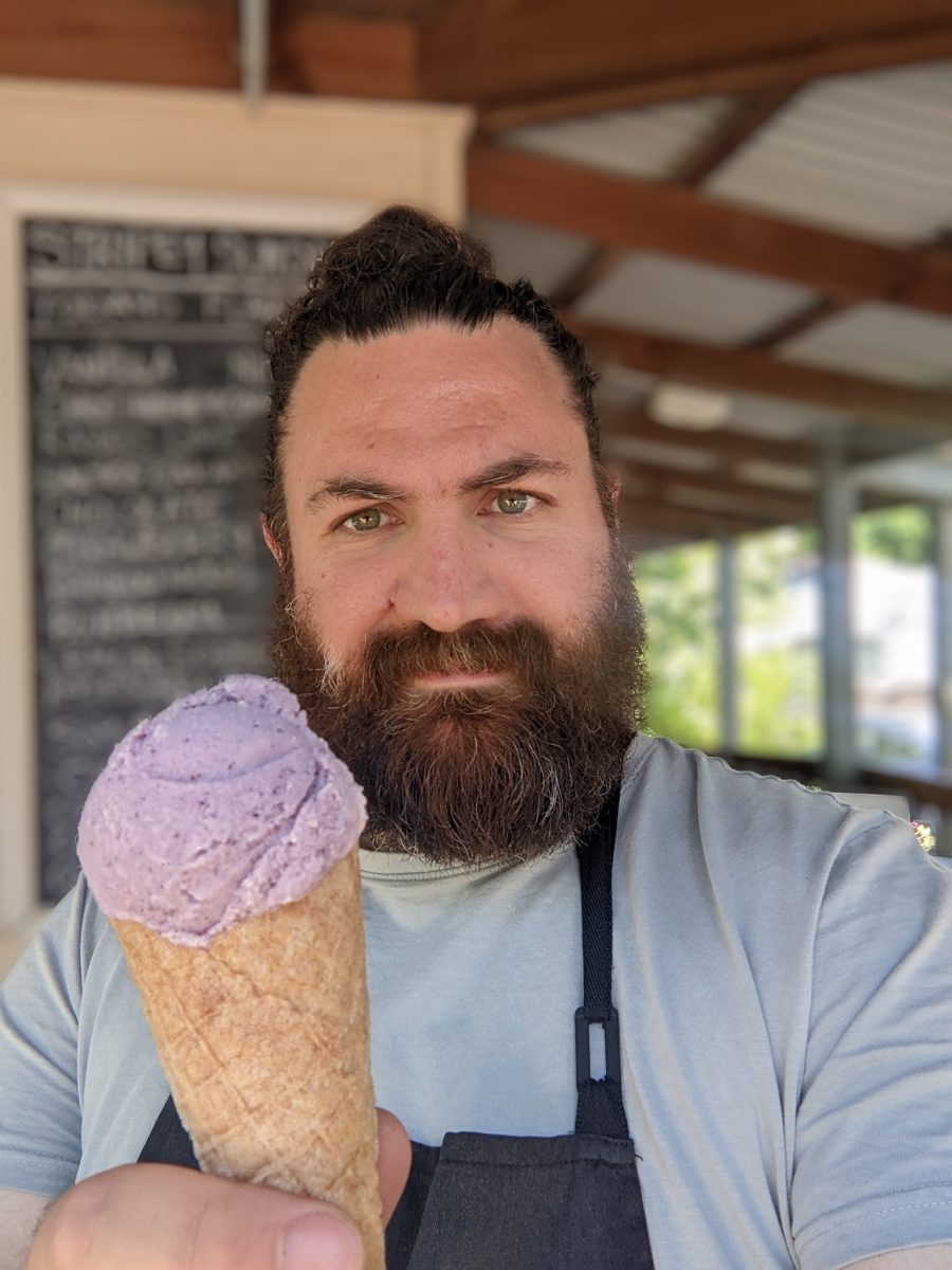 man holding an ice cream cone