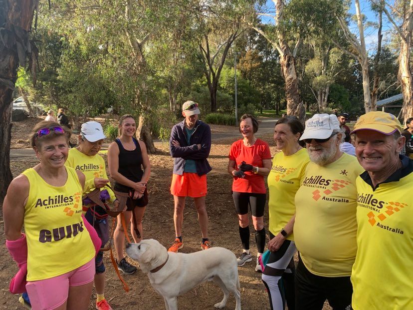 runners with dog