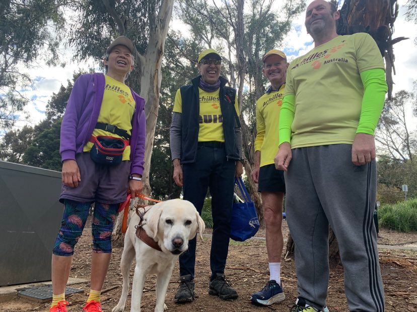 runners with dog