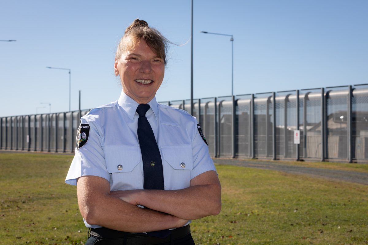 woman outside a prison