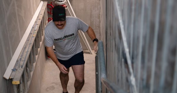 Running up Canberra's tallest tower is a tall task (but it was for a worthy cause)