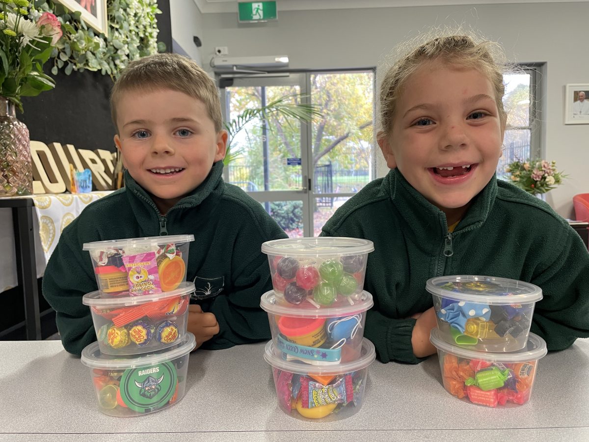 boy and girl with lollies