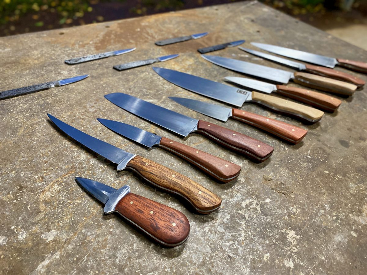 Selection of knives on a rough concrete bench