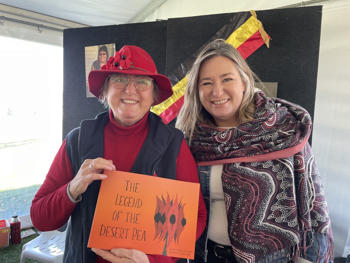 two women inside tent