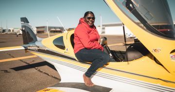 Whole hometown turns out to welcome 19-year-old's first flight from Canberra to Cape York