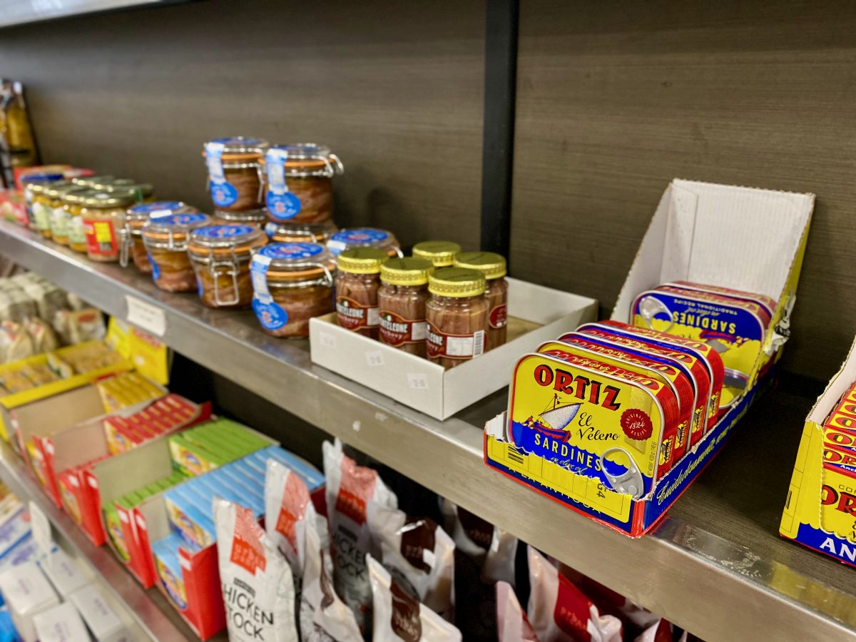 tin of ortiz anchovies on grocery shelf