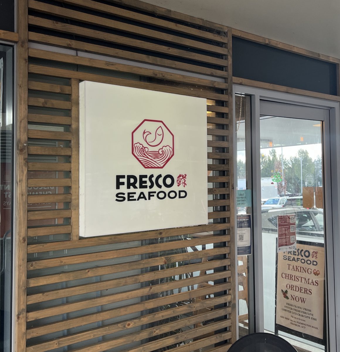 The front entrance to Fresco Seafoods with the Franklin carpark in the background.