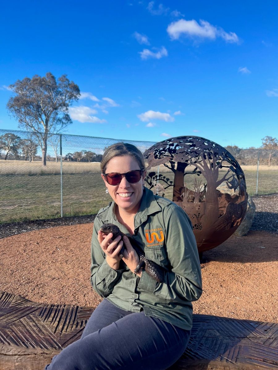 Woman with lizard