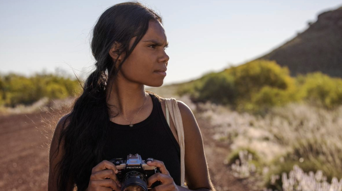 teenage girl with camera