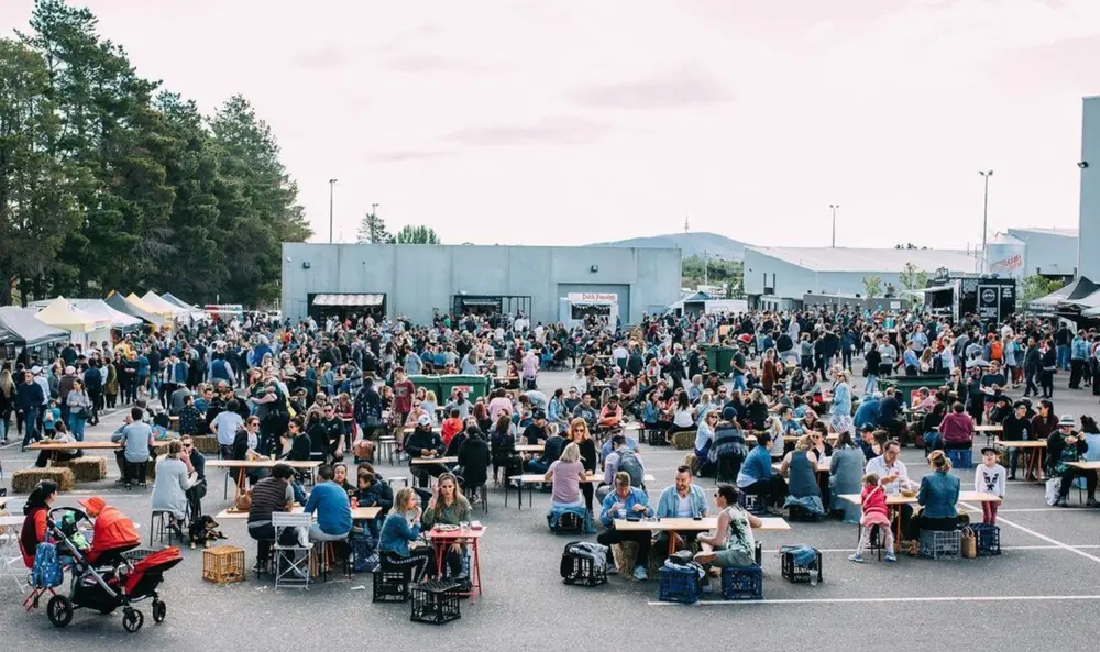 lots of people eating outside