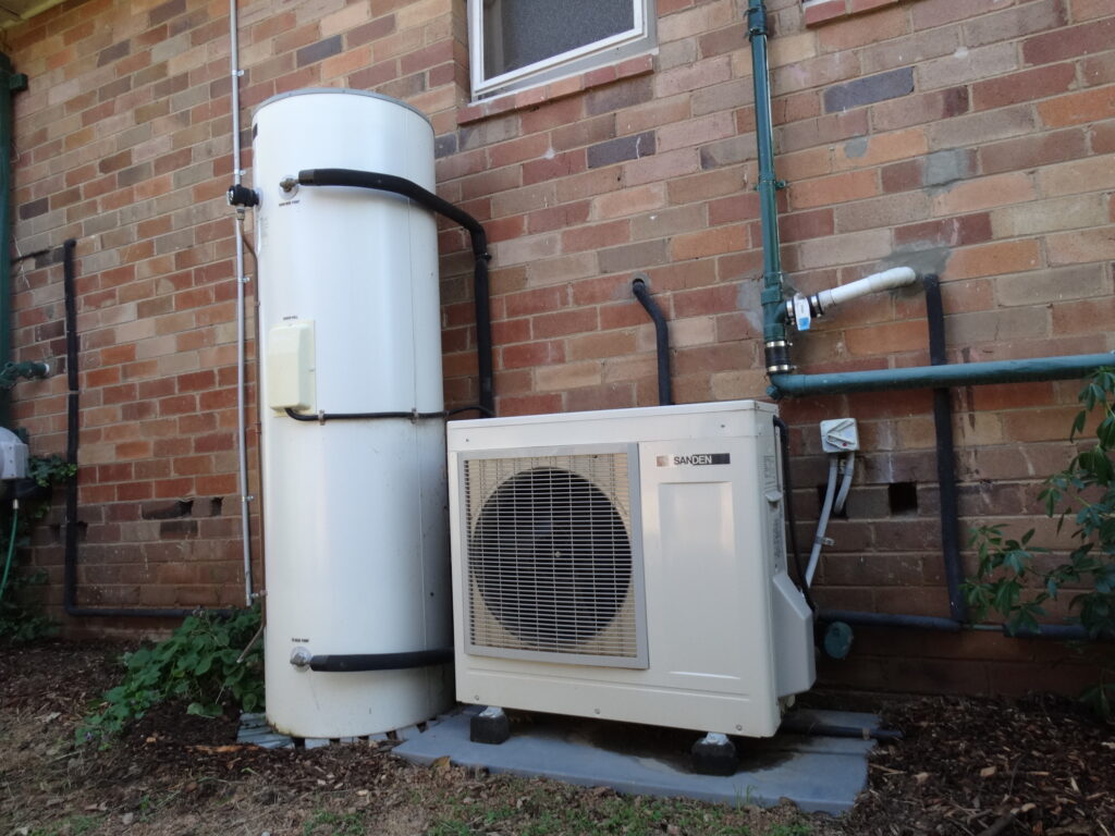 Heat pump on the outside of a house