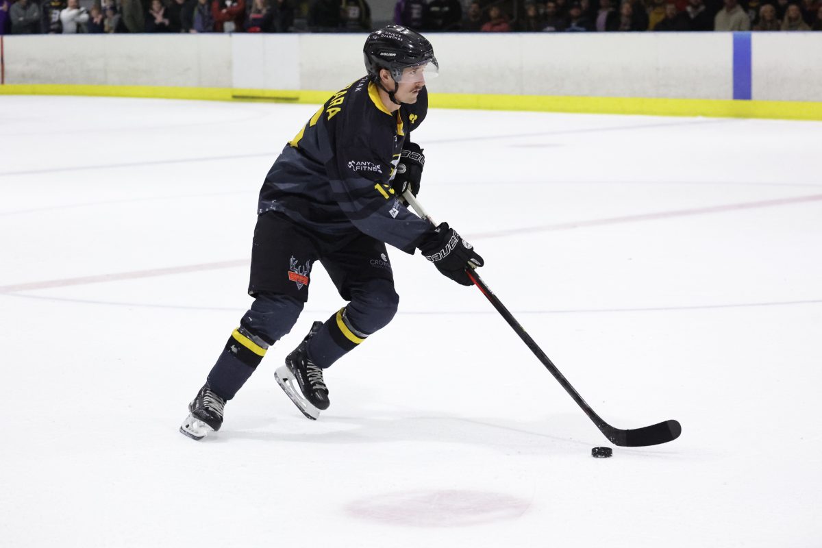 Casey Kubara playing ice hockey