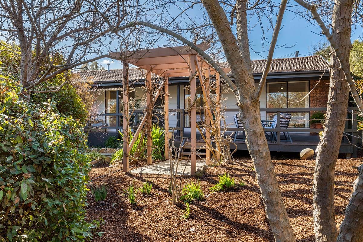 Front of house and pergola.