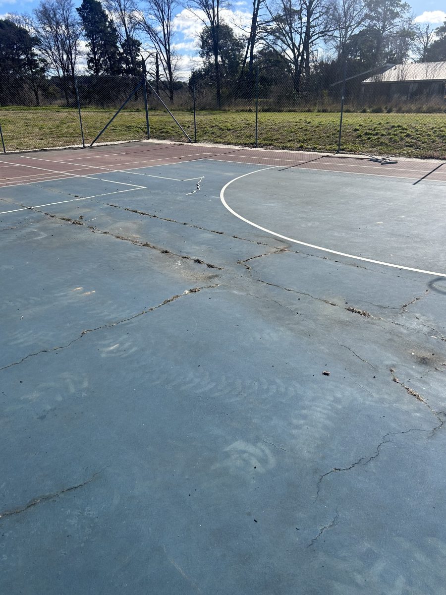 Damaged netball court. 