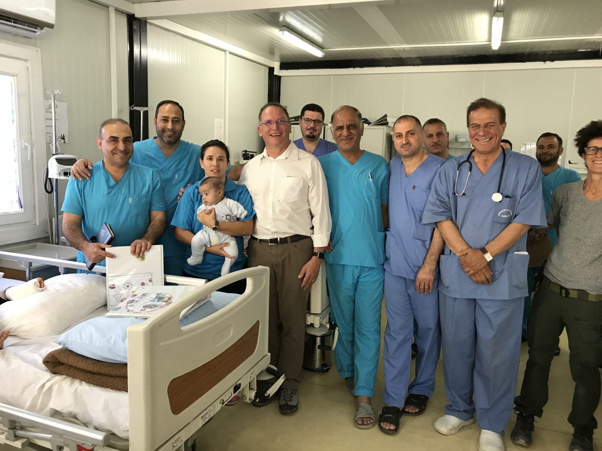 Aspen Medical CEO Glenn Keys with members of the Iraqi medical team in Mosul in 2017