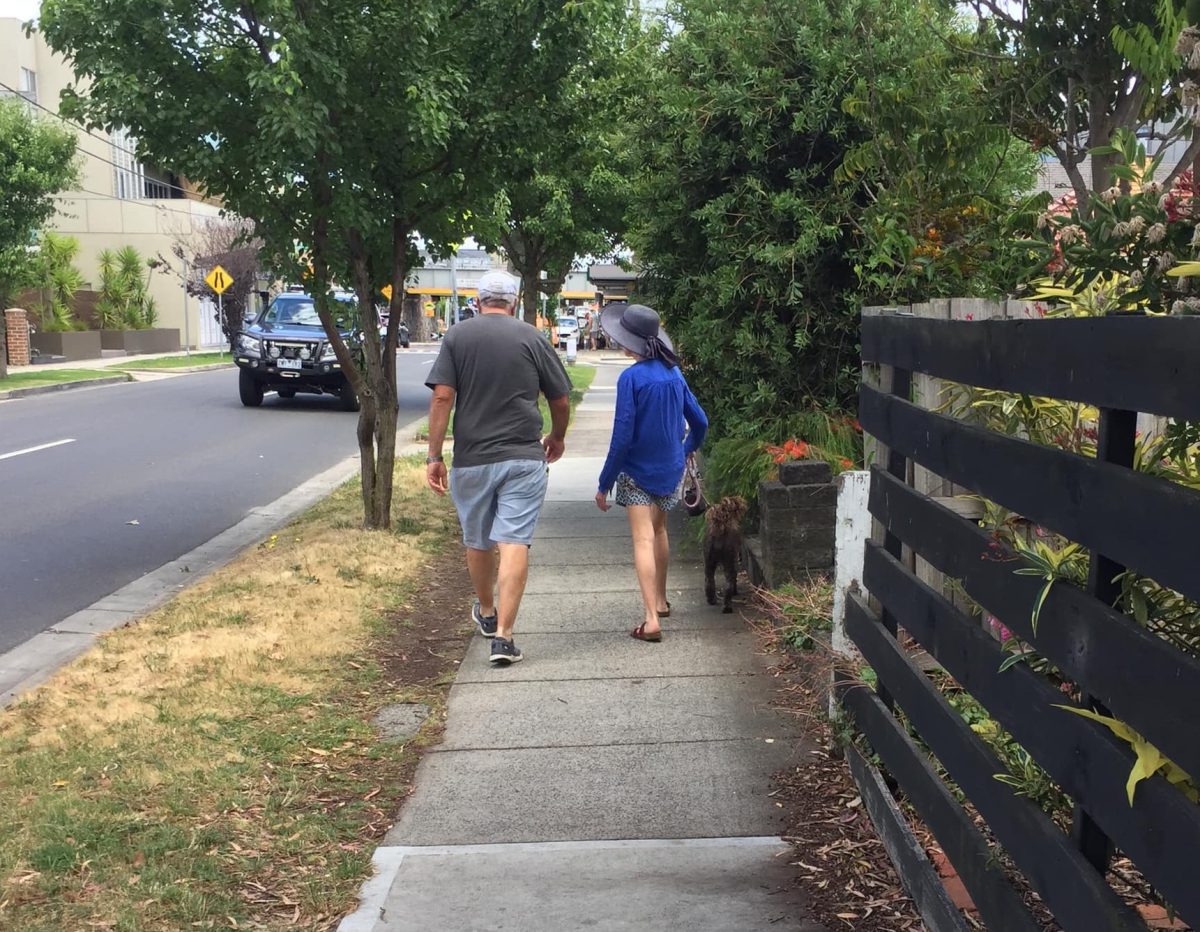 people walking on footpath