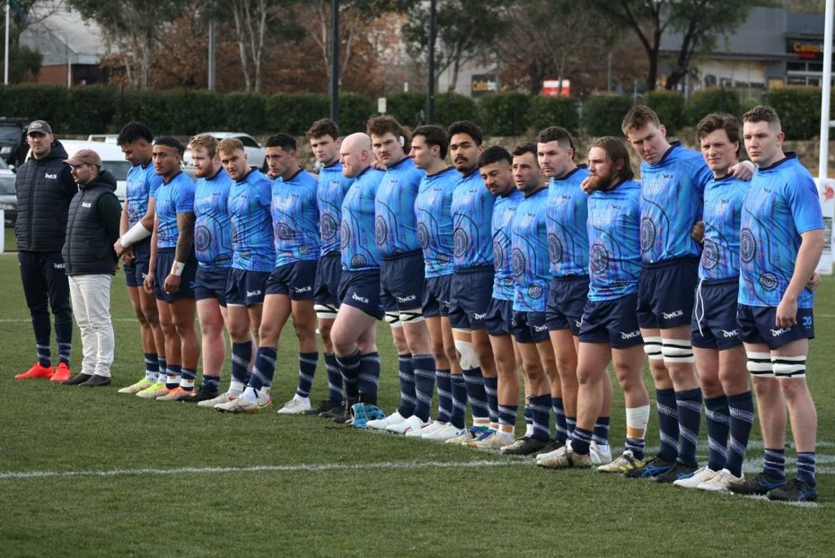 Uni Norths Owls team standing side-by-side.