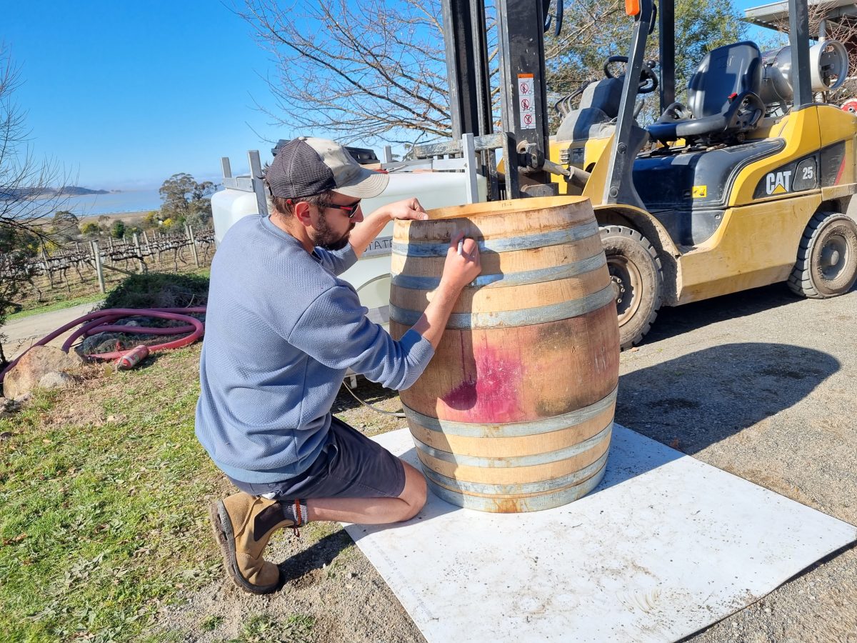 A cooper assembles a French oak barrel at Lerida Estate winery