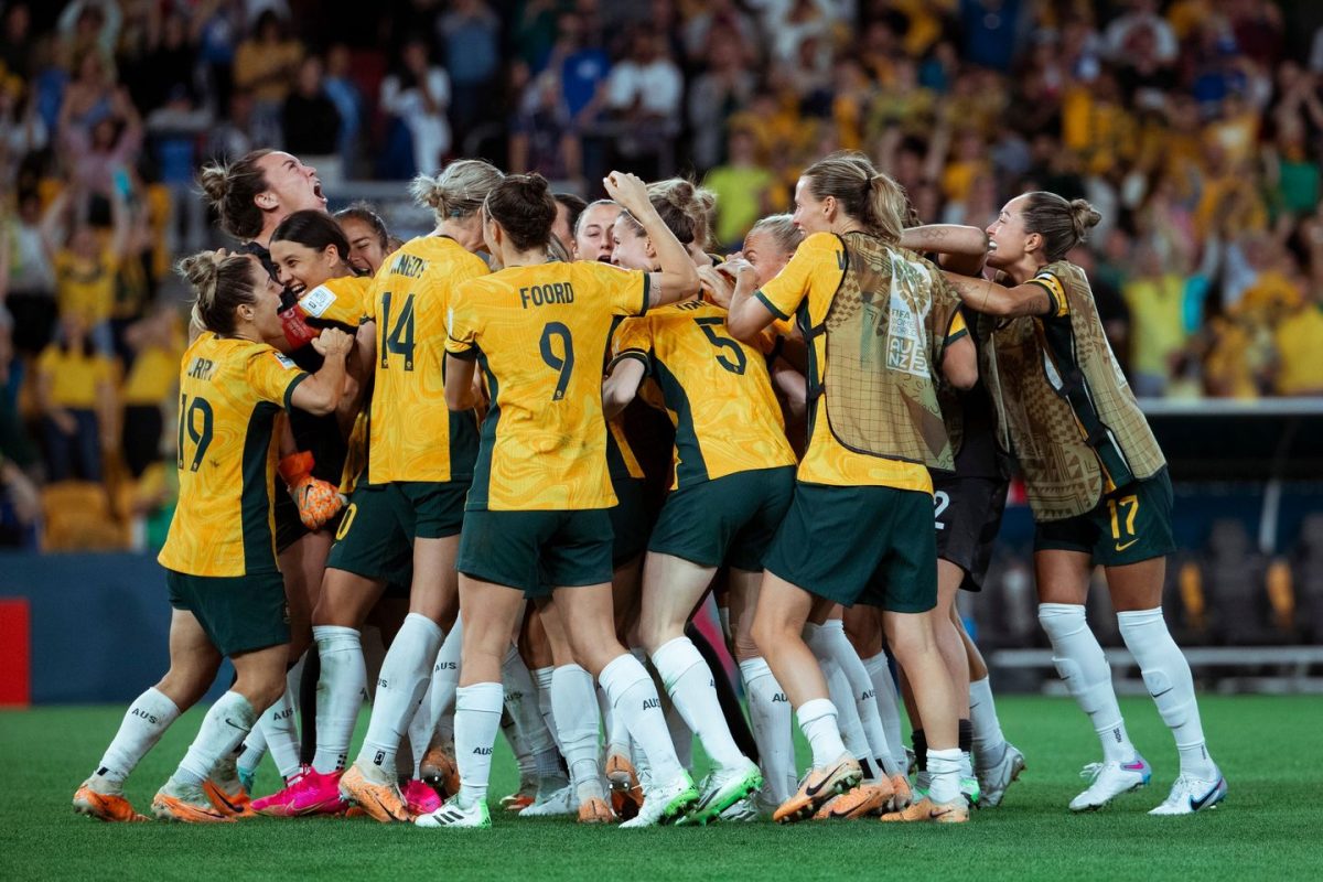 Matildas football players celebrating